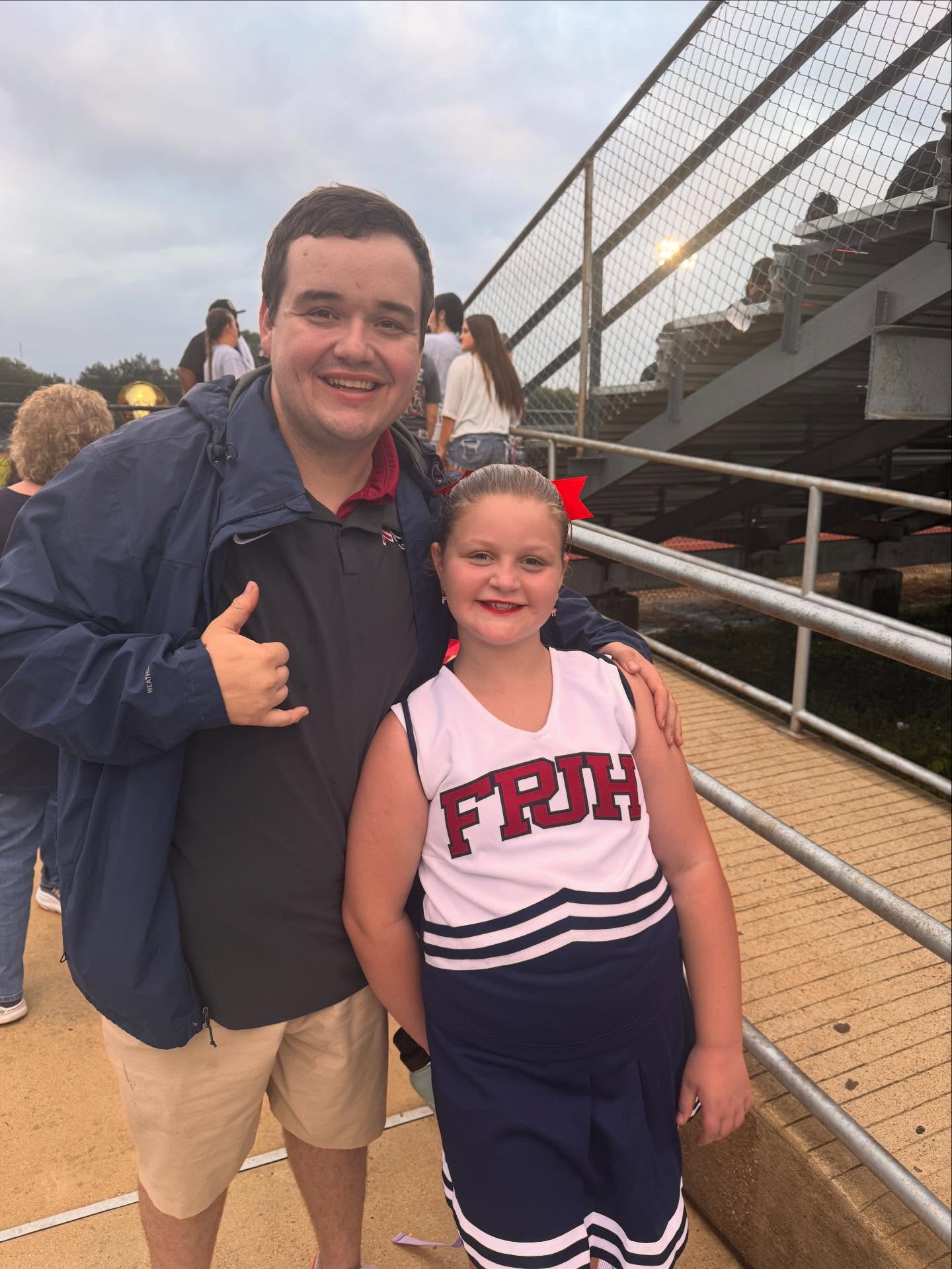 Garrison with Eleanor at a football game