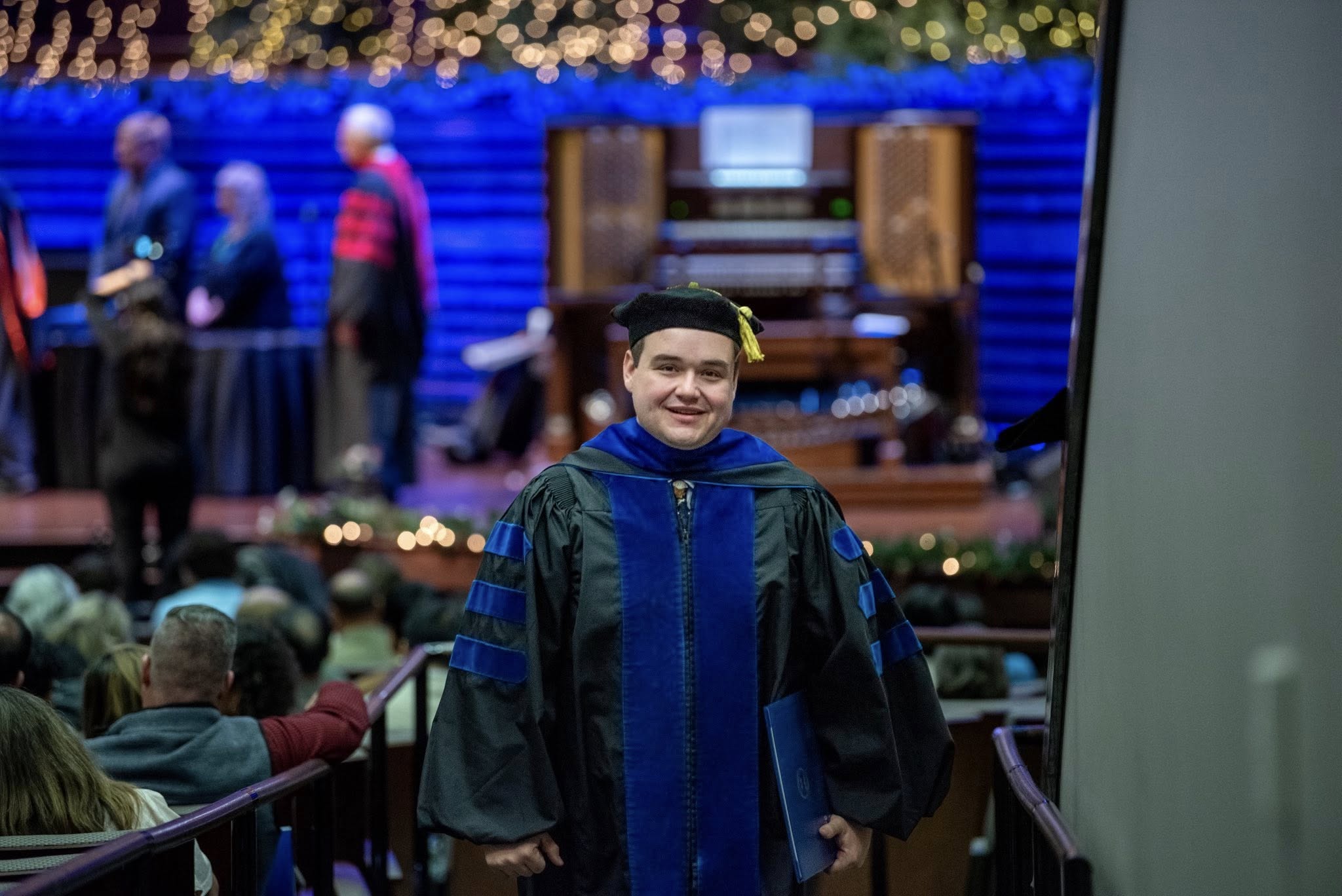 Garrison at PhD graduation ceremony